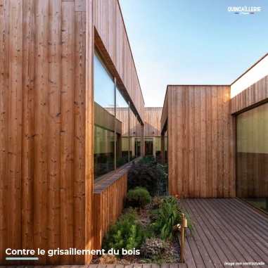 Mise en situation du protecteur bardage anti-UV sur une maison en bois